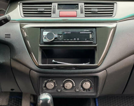 Чорний Міцубісі Lancer, об'ємом двигуна 2 л та пробігом 242 тис. км за 5900 $, фото 15 на Automoto.ua