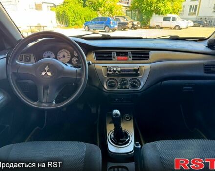 Чорний Міцубісі Lancer, об'ємом двигуна 1.6 л та пробігом 176 тис. км за 3777 $, фото 6 на Automoto.ua