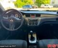 Чорний Міцубісі Lancer, об'ємом двигуна 1.6 л та пробігом 176 тис. км за 3777 $, фото 6 на Automoto.ua
