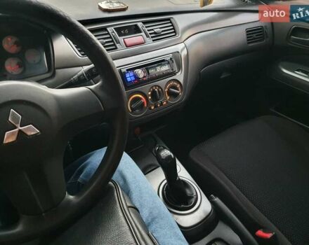 Чорний Міцубісі Lancer, об'ємом двигуна 1.58 л та пробігом 222 тис. км за 2999 $, фото 18 на Automoto.ua