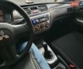 Чорний Міцубісі Lancer, об'ємом двигуна 1.58 л та пробігом 222 тис. км за 2999 $, фото 18 на Automoto.ua