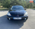 Чорний Міцубісі Lancer, об'ємом двигуна 1.58 л та пробігом 236 тис. км за 4500 $, фото 1 на Automoto.ua
