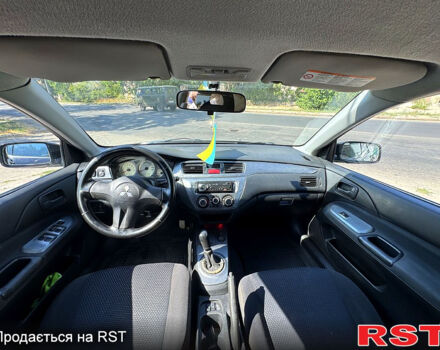 Черный Мицубиси Лансер, объемом двигателя 1.6 л и пробегом 300 тыс. км за 3599 $, фото 10 на Automoto.ua