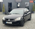Чорний Міцубісі Lancer, об'ємом двигуна 1.58 л та пробігом 230 тис. км за 3350 $, фото 14 на Automoto.ua