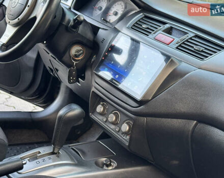 Міцубісі Lancer 2006 у Дніпро (Дніпропетровську) на Automoto.ua Чорний Міцубісі Lancer, об'ємом двигуна 2 л та пробігом 230 тис. км за 4900 $, фото 19 на Automoto.ua