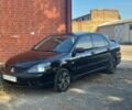 Чорний Міцубісі Lancer, об'ємом двигуна 2 л та пробігом 287 тис. км за 4216 $, фото 1 на Automoto.ua