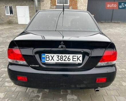 Чорний Міцубісі Lancer, об'ємом двигуна 1.58 л та пробігом 282 тис. км за 4100 $, фото 2 на Automoto.ua