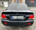 Чорний Міцубісі Lancer, об'ємом двигуна 1.58 л та пробігом 282 тис. км за 4100 $, фото 2 на Automoto.ua