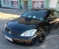 Чорний Міцубісі Lancer, об'ємом двигуна 1.6 л та пробігом 240 тис. км за 5400 $, фото 1 на Automoto.ua