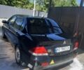 Черный Мицубиси Лансер, объемом двигателя 1.6 л и пробегом 330 тыс. км за 3200 $, фото 3 на Automoto.ua