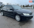 Чорний Міцубісі Lancer, об'ємом двигуна 1.58 л та пробігом 196 тис. км за 3800 $, фото 11 на Automoto.ua