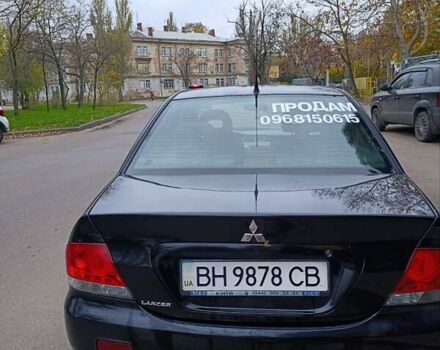 Чорний Міцубісі Lancer, об'ємом двигуна 1.6 л та пробігом 218 тис. км за 4300 $, фото 7 на Automoto.ua