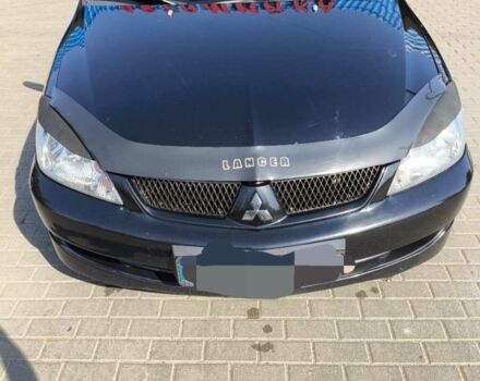 Чорний Міцубісі Lancer, об'ємом двигуна 2 л та пробігом 240 тис. км за 5600 $, фото 3 на Automoto.ua