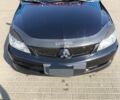 Чорний Міцубісі Lancer, об'ємом двигуна 2 л та пробігом 240 тис. км за 5600 $, фото 3 на Automoto.ua