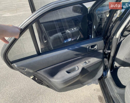 Чорний Міцубісі Lancer, об'ємом двигуна 1.58 л та пробігом 236 тис. км за 4500 $, фото 8 на Automoto.ua