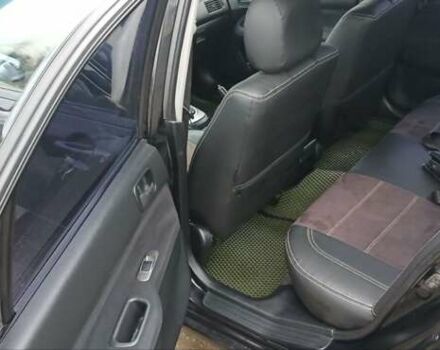 Чорний Міцубісі Lancer, об'ємом двигуна 1.6 л та пробігом 230 тис. км за 3250 $, фото 4 на Automoto.ua
