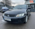 Чорний Міцубісі Lancer, об'ємом двигуна 1.58 л та пробігом 196 тис. км за 3800 $, фото 1 на Automoto.ua