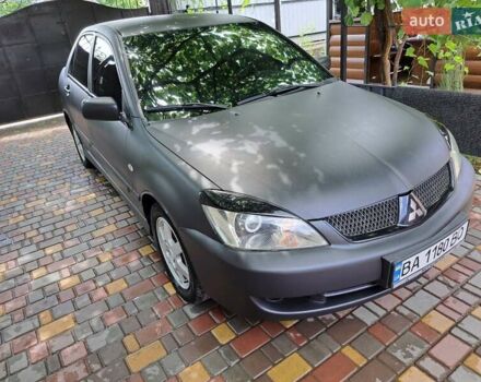 Чорний Міцубісі Lancer, об'ємом двигуна 1.58 л та пробігом 280 тис. км за 3950 $, фото 3 на Automoto.ua