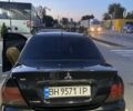 Черный Мицубиси Лансер, объемом двигателя 1.6 л и пробегом 257 тыс. км за 4500 $, фото 6 на Automoto.ua