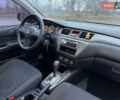 Черный Мицубиси Лансер, объемом двигателя 1.58 л и пробегом 220 тыс. км за 4450 $, фото 4 на Automoto.ua