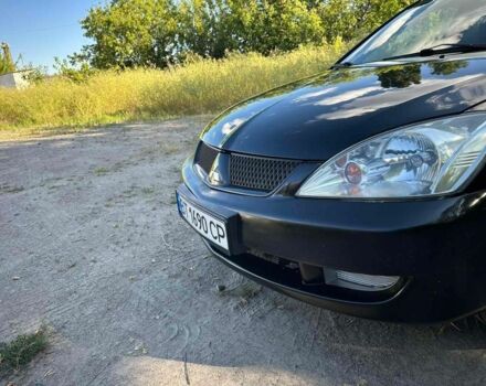 Черный Мицубиси Лансер, объемом двигателя 1.6 л и пробегом 289 тыс. км за 3200 $, фото 13 на Automoto.ua