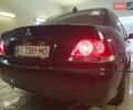Чорний Міцубісі Lancer, об'ємом двигуна 1.58 л та пробігом 222 тис. км за 2999 $, фото 2 на Automoto.ua