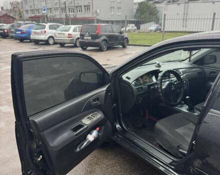 Черный Мицубиси Лансер, объемом двигателя 1.6 л и пробегом 368 тыс. км за 3200 $, фото 6 на Automoto.ua