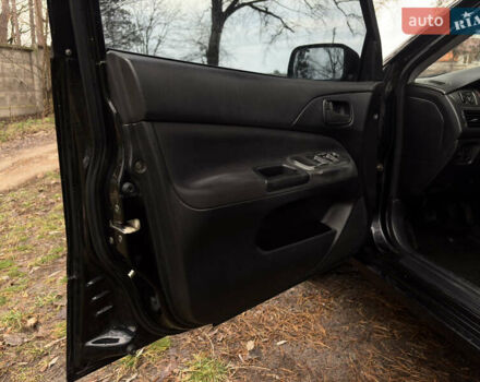 Чорний Міцубісі Lancer, об'ємом двигуна 1.58 л та пробігом 210 тис. км за 3900 $, фото 10 на Automoto.ua