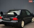 Чорний Міцубісі Lancer, об'ємом двигуна 1.6 л та пробігом 256 тис. км за 4999 $, фото 7 на Automoto.ua
