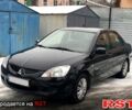 Чорний Міцубісі Lancer, об'ємом двигуна 1.6 л та пробігом 181 тис. км за 5400 $, фото 1 на Automoto.ua