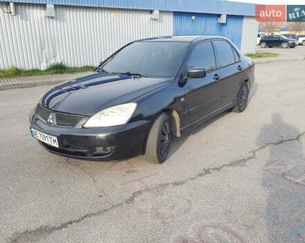 Чорний Міцубісі Lancer, об'ємом двигуна 1.58 л та пробігом 290 тис. км за 3200 $, фото 7 на Automoto.ua