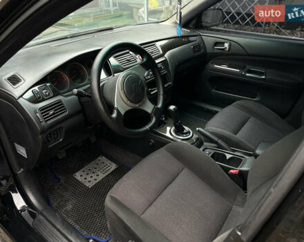 Чорний Міцубісі Lancer, об'ємом двигуна 2 л та пробігом 242 тис. км за 5900 $, фото 9 на Automoto.ua