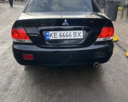 Черный Мицубиси Лансер, объемом двигателя 1.6 л и пробегом 299 тыс. км за 3480 $, фото 2 на Automoto.ua