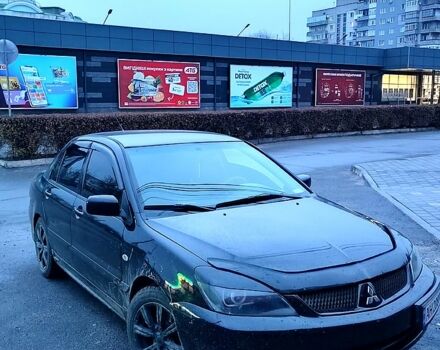 Чорний Міцубісі Lancer, об'ємом двигуна 1.6 л та пробігом 240 тис. км за 4000 $, фото 1 на Automoto.ua
