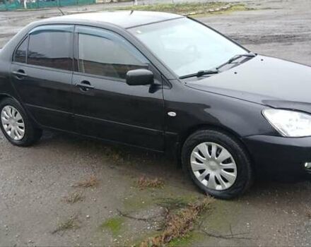 Чорний Міцубісі Lancer, об'ємом двигуна 1.6 л та пробігом 230 тис. км за 3250 $, фото 1 на Automoto.ua