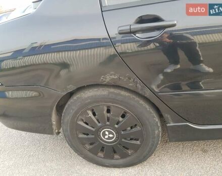 Чорний Міцубісі Lancer, об'ємом двигуна 1.58 л та пробігом 290 тис. км за 3200 $, фото 21 на Automoto.ua