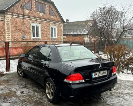 Чорний Міцубісі Lancer, об'ємом двигуна 1.6 л та пробігом 213 тис. км за 4000 $, фото 1 на Automoto.ua