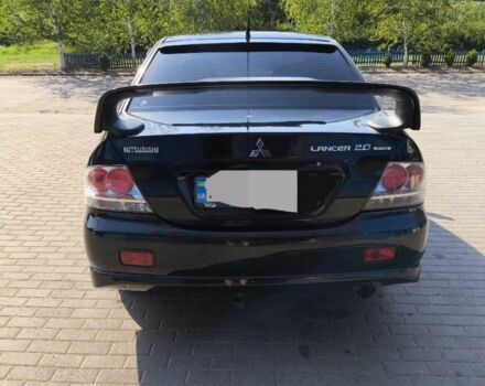 Чорний Міцубісі Lancer, об'ємом двигуна 2 л та пробігом 240 тис. км за 5600 $, фото 2 на Automoto.ua