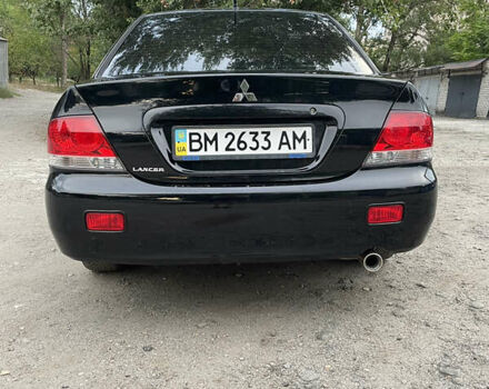 Чорний Міцубісі Lancer, об'ємом двигуна 1.6 л та пробігом 240 тис. км за 4599 $, фото 6 на Automoto.ua