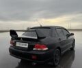 Чорний Міцубісі Lancer, об'ємом двигуна 1.6 л та пробігом 240 тис. км за 4186 $, фото 5 на Automoto.ua