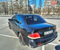 Черный Мицубиси Лансер, объемом двигателя 1.58 л и пробегом 250 тыс. км за 3700 $, фото 4 на Automoto.ua