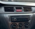 Чорний Міцубісі Lancer, об'ємом двигуна 1.6 л та пробігом 203 тис. км за 4600 $, фото 18 на Automoto.ua