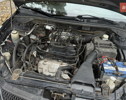 Чорний Міцубісі Lancer, об'ємом двигуна 1.58 л та пробігом 386 тис. км за 4450 $, фото 22 на Automoto.ua