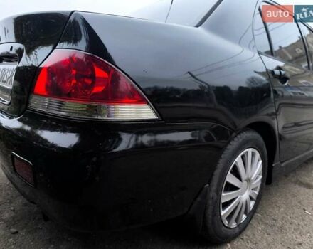 Черный Мицубиси Лансер, объемом двигателя 1.58 л и пробегом 246 тыс. км за 4200 $, фото 15 на Automoto.ua