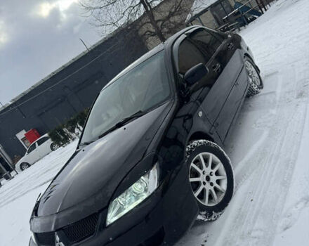 Чорний Міцубісі Lancer, об'ємом двигуна 1.58 л та пробігом 340 тис. км за 3550 $, фото 6 на Automoto.ua