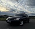 Черный Мицубиси Лансер, объемом двигателя 1.6 л и пробегом 203 тыс. км за 3900 $, фото 1 на Automoto.ua