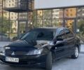 Чорний Міцубісі Lancer, об'ємом двигуна 2 л та пробігом 231 тис. км за 4294 $, фото 1 на Automoto.ua