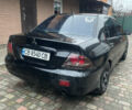 Чорний Міцубісі Lancer, об'ємом двигуна 1.59 л та пробігом 305 тис. км за 2950 $, фото 15 на Automoto.ua