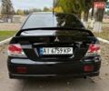 Чорний Міцубісі Lancer, об'ємом двигуна 1.58 л та пробігом 386 тис. км за 4450 $, фото 4 на Automoto.ua