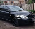 Чорний Міцубісі Lancer, об'ємом двигуна 1.59 л та пробігом 185 тис. км за 4900 $, фото 7 на Automoto.ua